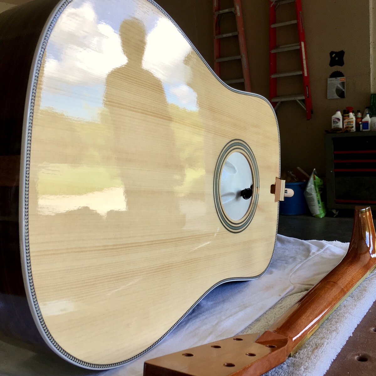 Freshly lacquered top — silhouette reflection